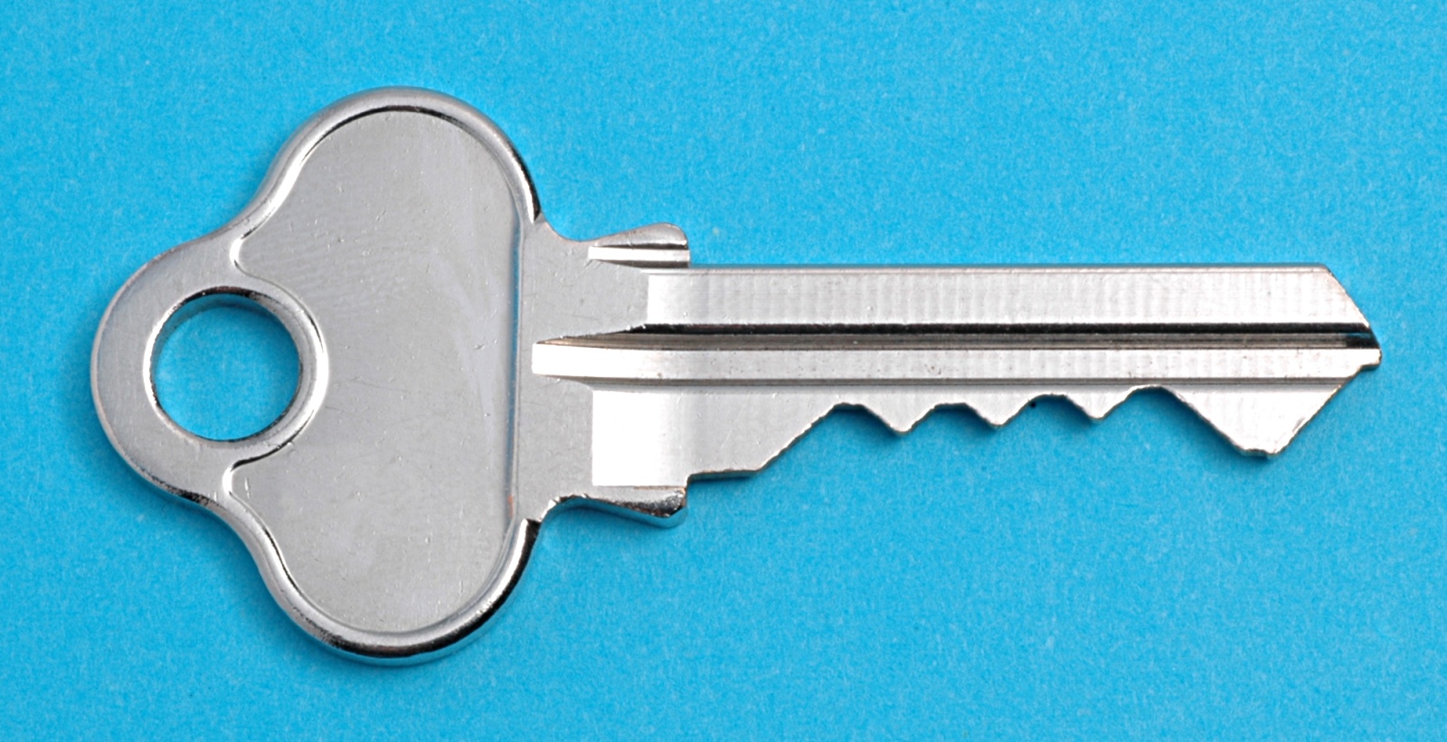 First time home buyer Silver key on blue background